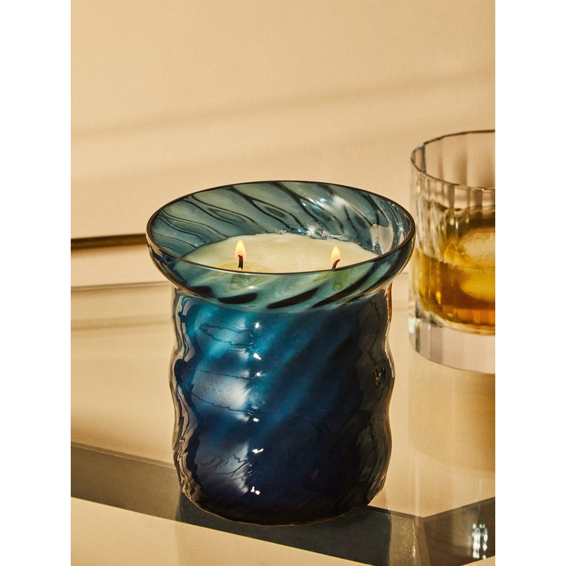 The First Hand-Poured Scented Candle